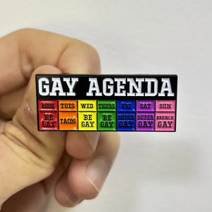 Close View of Hand Holding Humorous LGBTQ Pride Pin